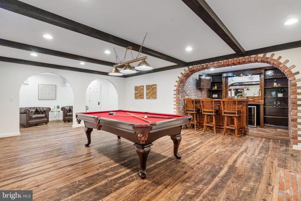 Billiard Table, Game Room, Interior, Pendant Lights, Recessed Lighting, Stone Walls, Wooden Beams, Wood Texture Flooring