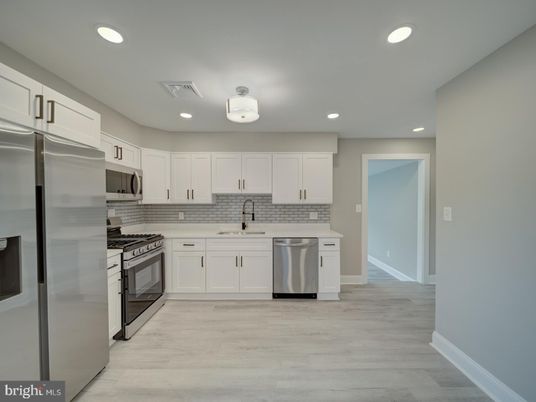 Interior, Kitchen, Recessed Lighting, Stainless Steel Appliances, Wood Texture Flooring