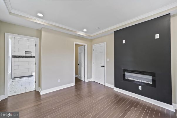 Empty room, Fireplace, Interior, Recessed Lighting, Wood Texture Flooring
