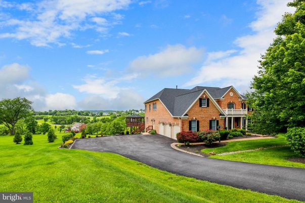 Attached, Backyard, Exterior, Facade, Brick Facade, Brick Traditional