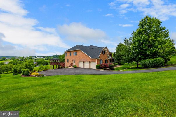 Attached, Backyard, Exterior, Facade, Brick Facade, French Provincial
