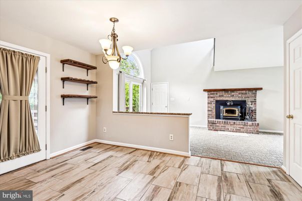 Chandelier, Empty room, Fireplace, Interior, Wood Texture Flooring