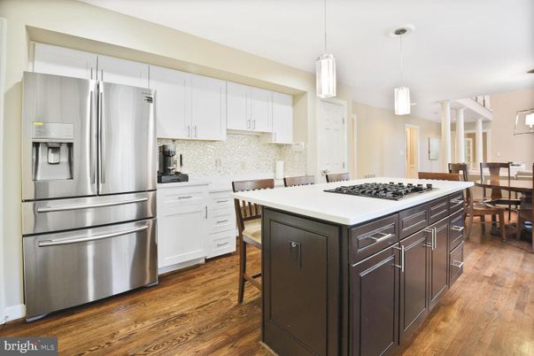 Dining room, Interior, Kitchen, Pendant Lights, Stainless Steel Appliances, Wood Texture Flooring