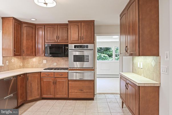 Interior, Kitchen, Recessed Lighting, Stainless Steel Appliances, Tile Countertops
