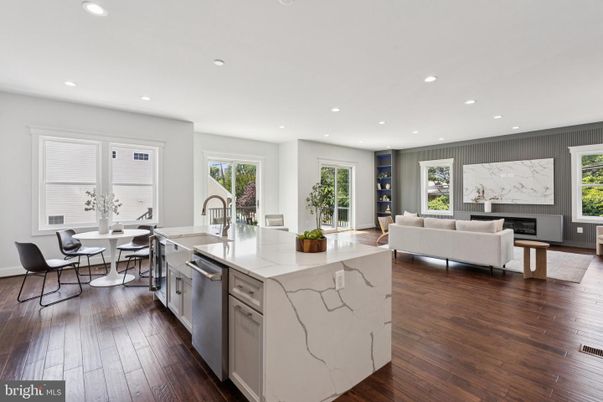 Dining room, Fireplace, Interior, Kitchen, Living room, Recessed Lighting, Wood Texture Flooring