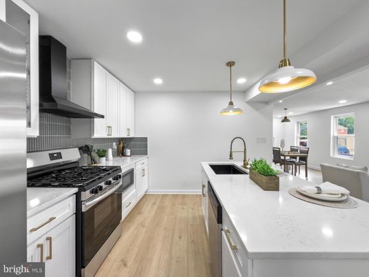 Dining room, Interior, Kitchen, Pendant Lights, Recessed Lighting, Stainless Steel Appliances, Wood Texture Flooring