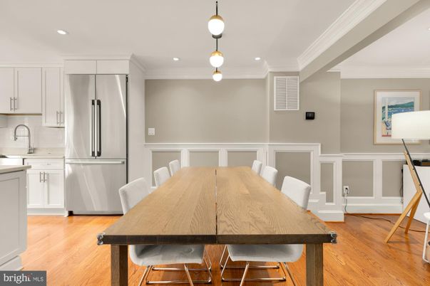 Dining room, Interior, Kitchen, Pendant Lights, Recessed Lighting, Stainless Steel Appliances, Wood Texture Flooring