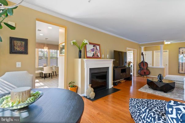 Dining room, Fireplace, Interior, Pendant Lights, Recessed Lighting, Wood Texture Flooring