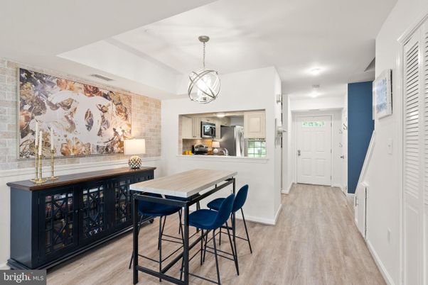 Interior, Kitchen, Pendant Lights, Recessed Lighting, Stainless Steel Appliances, Stone Walls, Wood Texture Flooring
