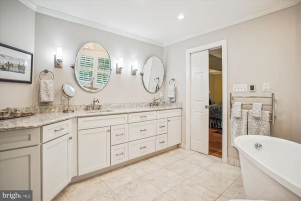 Bathroom, Dual Sink Vanities, Free Standing Baths, Interior, Recessed Lighting, Wood Texture Flooring