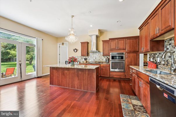 Chandelier, Interior, Kitchen, Recessed Lighting, Stainless Steel Appliances, Wood Texture Flooring