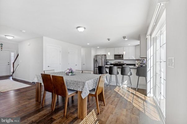 Dining room, Interior, Kitchen, Recessed Lighting, Stainless Steel Appliances, Wood Texture Flooring