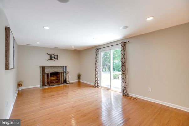 Empty room, Fireplace, Interior, Recessed Lighting, Wood Texture Flooring