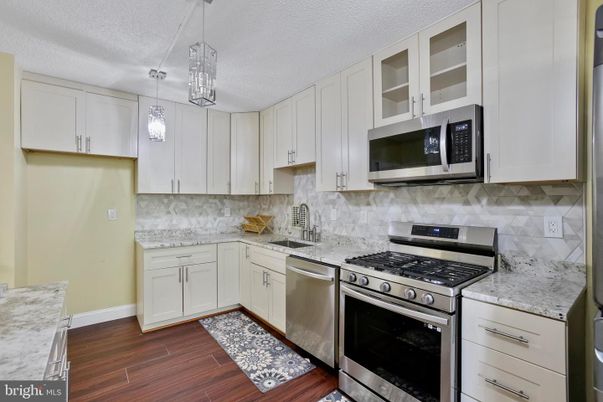 Interior, Kitchen, Pendant Lights, Stainless Steel Appliances, Wood Texture Flooring