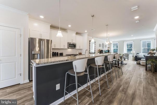 Dining room, Interior, Kitchen, Living room, Pendant Lights, Recessed Lighting, Stainless Steel Appliances, Wood Texture Flooring