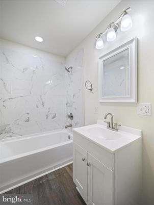 Bathroom, Interior, Marble Walls, Recessed Lighting, Wood Texture Flooring