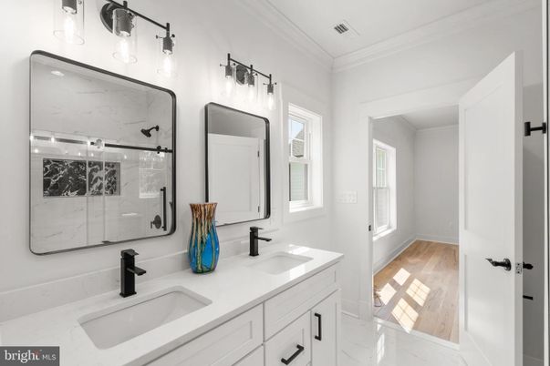 Bathroom, Dual Sink Vanities, Interior, Marble, Marble Walls, Wood Texture Flooring