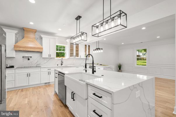 Interior, Kitchen, Marble Walls, Pendant Lights, Recessed Lighting, Wood Texture Flooring