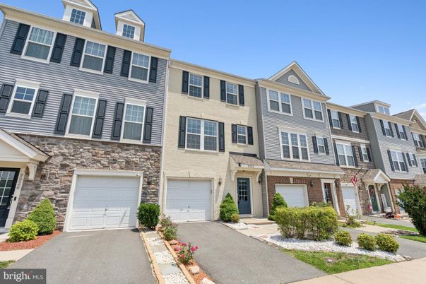 Attached, Exterior, Facade, Brick Facade, Rowhouse