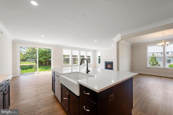 Chandelier, Fireplace, Interior, Kitchen, Recessed Lighting, Wood Texture Flooring