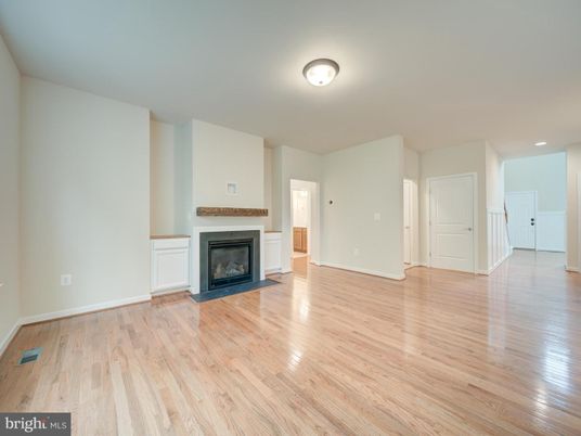 Empty room, Fireplace, Interior, Recessed Lighting, Wood Texture Flooring