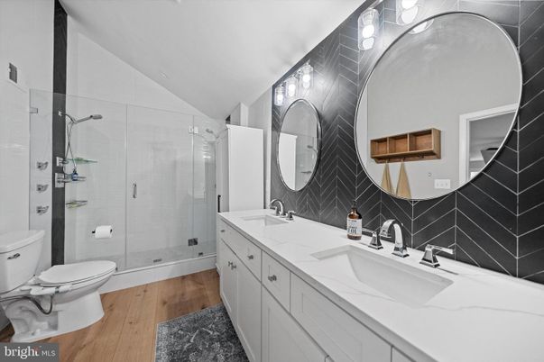 Bathroom, Dual Sink Vanities, Glass Shower, Interior, Wood Texture Flooring
