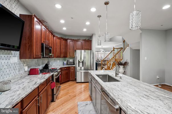 Interior, Kitchen, Pendant Lights, Recessed Lighting, Stainless Steel Appliances, Wood Texture Flooring