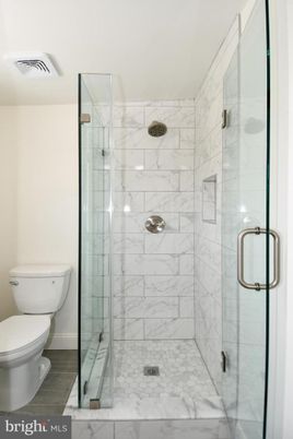 Bathroom, Glass Shower, Interior, Marble Walls, Wood Texture Flooring