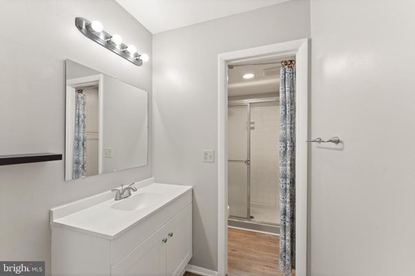 Bathroom, Glass Shower, Interior, Recessed Lighting, Wood Texture Flooring