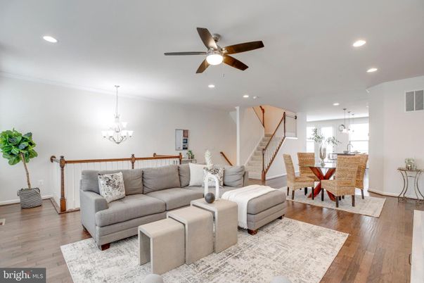 Chandelier, Dining room, Interior, Living room, Pendant Lights, Recessed Lighting, Wood Texture Flooring