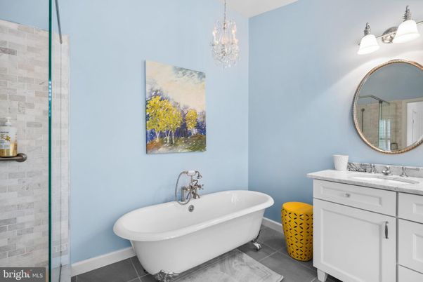 Bathroom, Chandelier, Free Standing Baths, Interior, Pendant Lights, Stone Walls