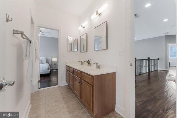 Bathroom, Bedroom, Dual Sink Vanities, Interior, Recessed Lighting, Wood Texture Flooring