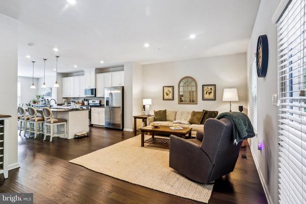 Dining room, Interior, Kitchen, Living room, Pendant Lights, Recessed Lighting, Stainless Steel Appliances, Wood Texture Flooring