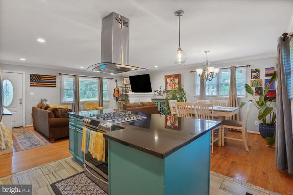 Chandelier, Dining room, Interior, Kitchen, Living room, Pendant Lights, Recessed Lighting, Wood Texture Flooring