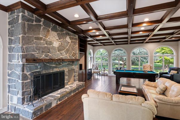 Billiard Table, Fireplace, Game Room, Interior, Living room, Recessed Lighting, Stone Walls, Wooden Beams, Wood Texture Flooring