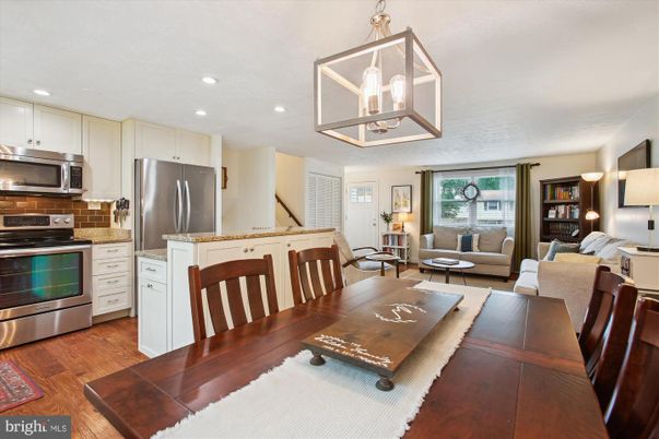 Dining room, Interior, Kitchen, Living room, Pendant Lights, Recessed Lighting, Stainless Steel Appliances, Wood Texture Flooring