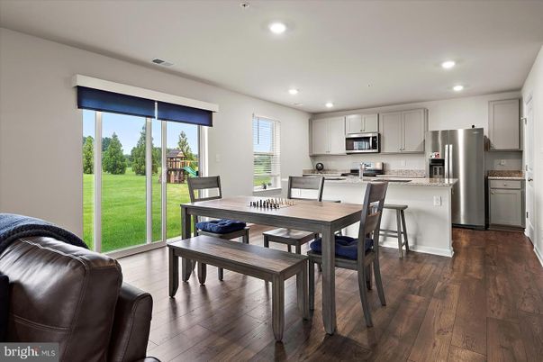 Dining room, Interior, Kitchen, Recessed Lighting, Stainless Steel Appliances, Wood Texture Flooring