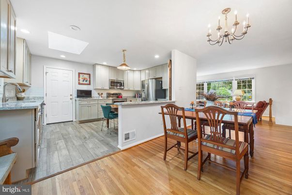 Chandelier, Dining room, Interior, Kitchen, Recessed Lighting, Stainless Steel Appliances, Wood Texture Flooring