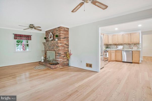Fireplace, Interior, Kitchen, Recessed Lighting, Stone Walls, Wood Texture Flooring