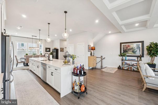 Dining room, Interior, Kitchen, Pendant Lights, Recessed Lighting, Stainless Steel Appliances, Wood Texture Flooring
