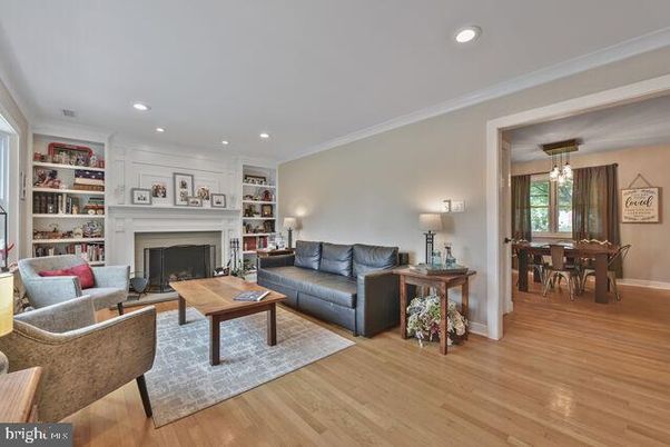 Dining room, Fireplace, Interior, Living room, Pendant Lights, Recessed Lighting, Wood Texture Flooring