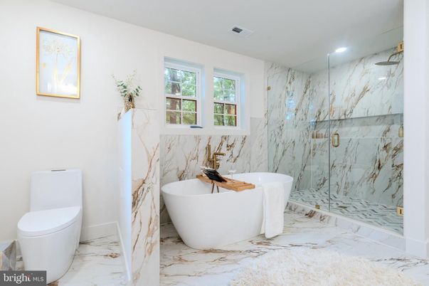 Bathroom, Free Standing Baths, Glass Shower, Interior, Marble, Marble Walls, Recessed Lighting