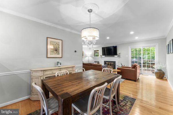 Chandelier, Dining room, Fireplace, Interior, Living room, Recessed Lighting, Wood Texture Flooring