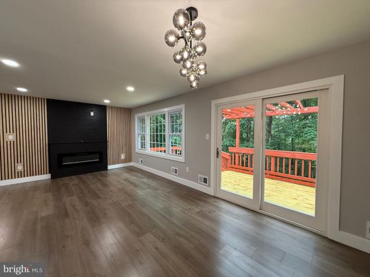 Empty room, Fireplace, Interior, Pendant Lights, Recessed Lighting, Wood Texture Flooring
