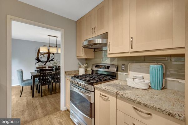 Dining room, Interior, Kitchen, Pendant Lights, Stainless Steel Appliances, Wood Texture Flooring