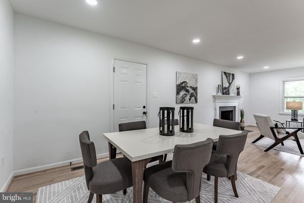 Dining room, Fireplace, Interior, Recessed Lighting, Wood Texture Flooring