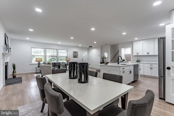 Dining room, Fireplace, Interior, Kitchen, Living room, Recessed Lighting, Wood Texture Flooring