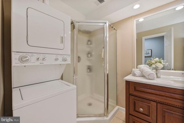 Bathroom, Glass Shower, Interior, Recessed Lighting, Utility Closets, Washer