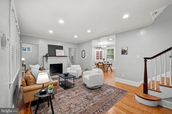 Chandelier, Dining room, Fireplace, Interior, Living room, Recessed Lighting, Wood Texture Flooring