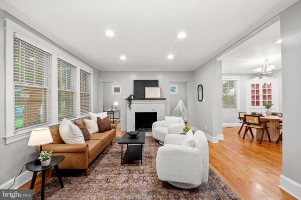 Dining room, Fireplace, Interior, Living room, Recessed Lighting, Wood Texture Flooring